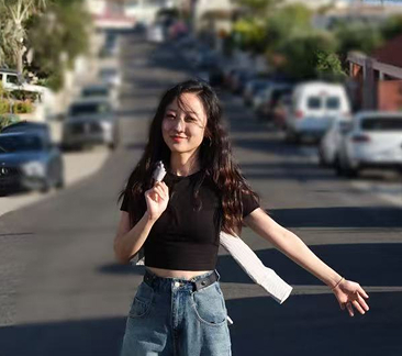 Rui standing outdoors